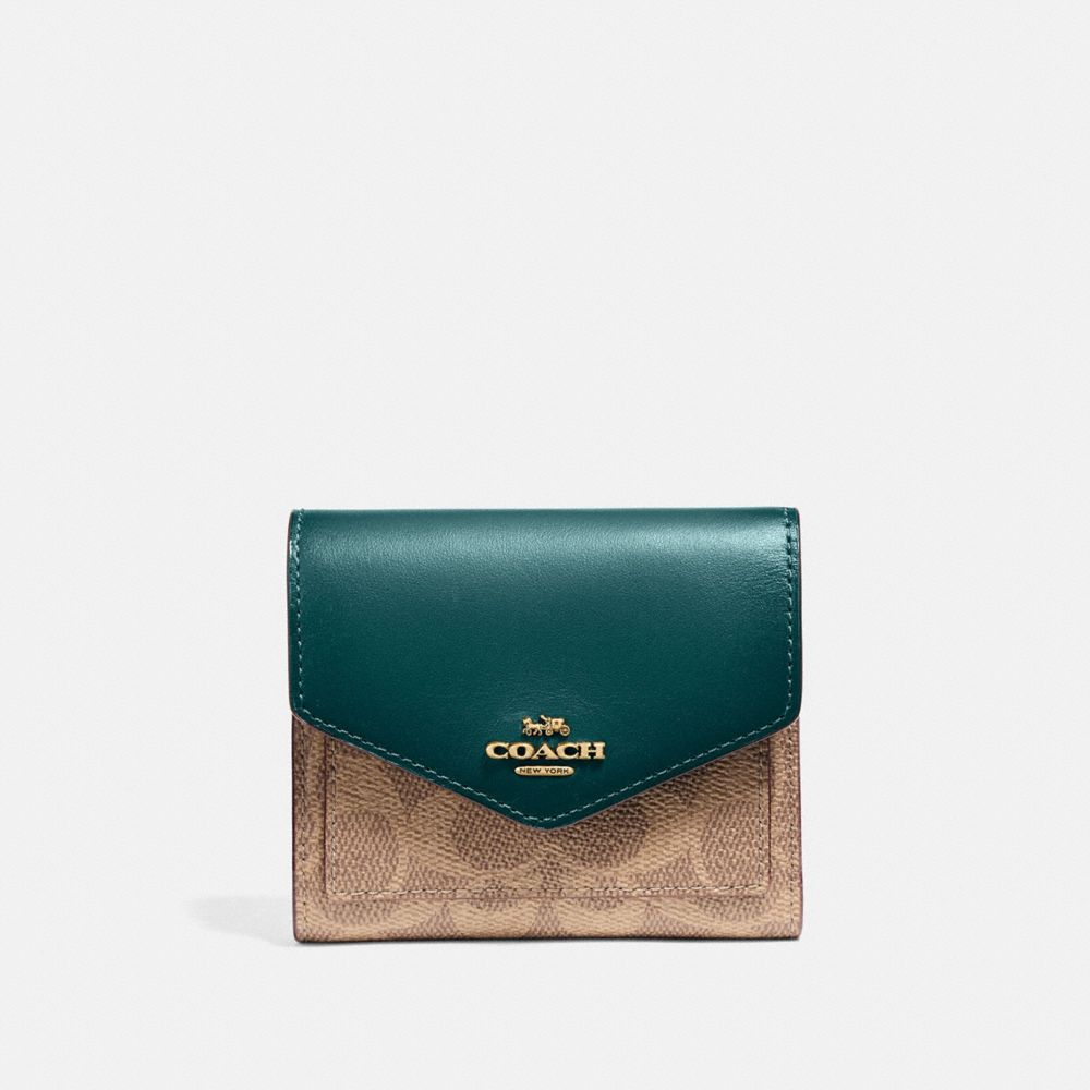 CARTERA PEQUE&Ntilde;A EN LONA DE LA FIRMA CON BLOQUES DE COLOR