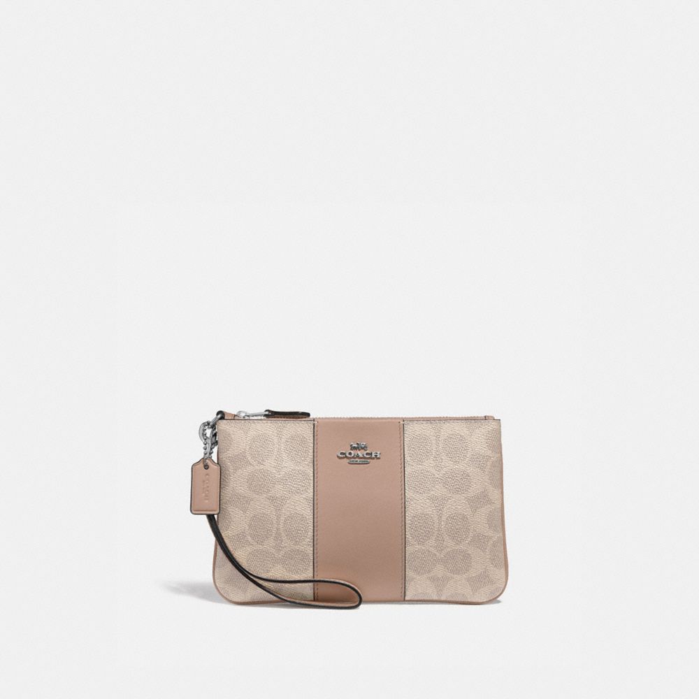 SMALL WRISTLET IN COLORBLOCK SIGNATURE CANVAS