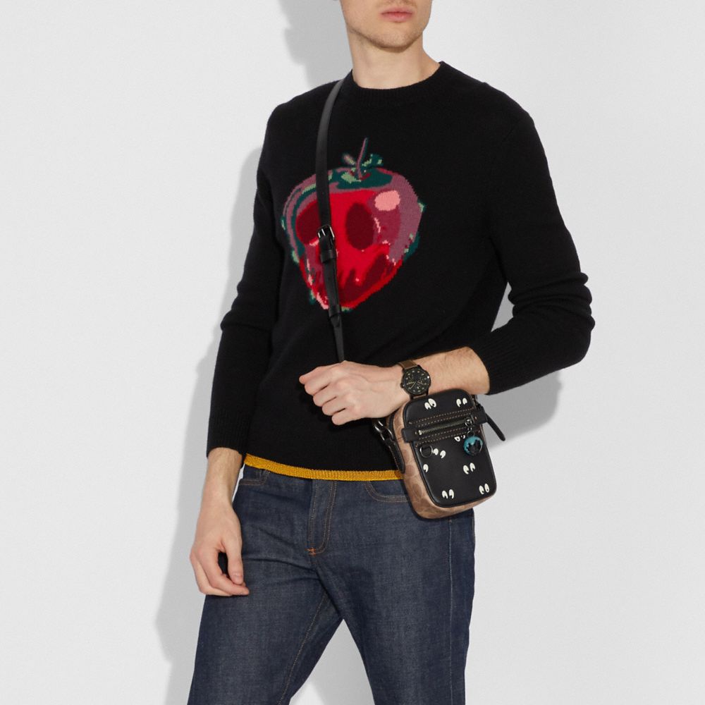 DISNEY X COACH DYLAN 10 WITH SPOOKY EYES PRINT - Alternate View 1