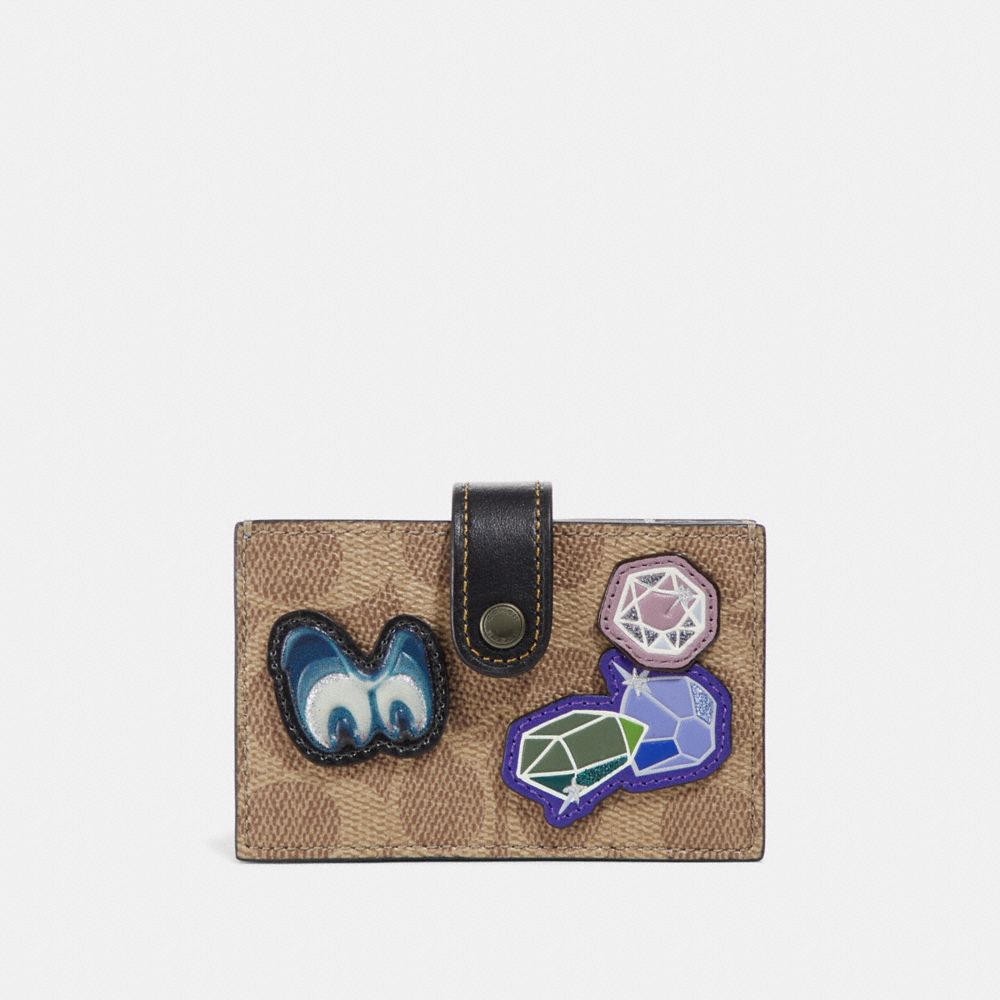 DISNEY X COACH ACCORDION CARD CASE IN SIGNATURE PATCHWORK