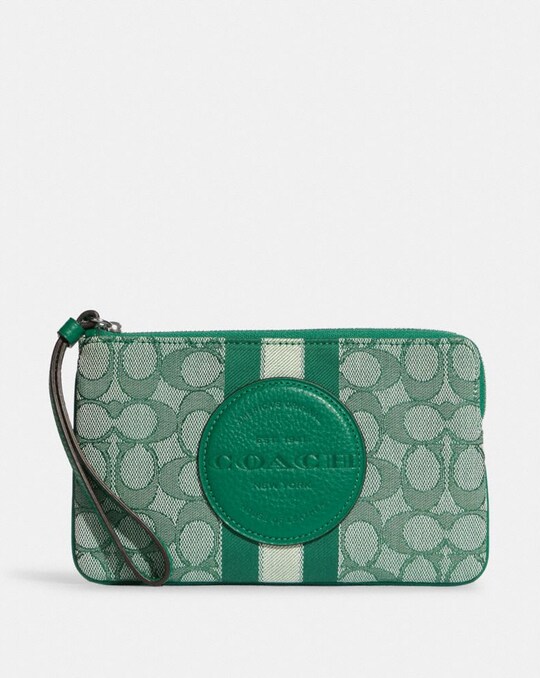 DEMPSEY LARGE CORNER ZIP WRISTLET IN SIGNATURE JACQUARD WITH STRIPE AND COACH PATCH